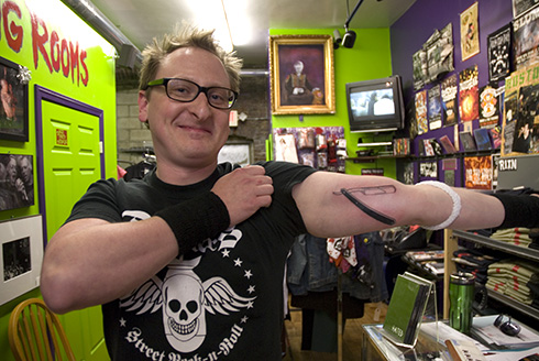 New tattoo. Showing off a brand new tattoo. Shot at Horror Business in